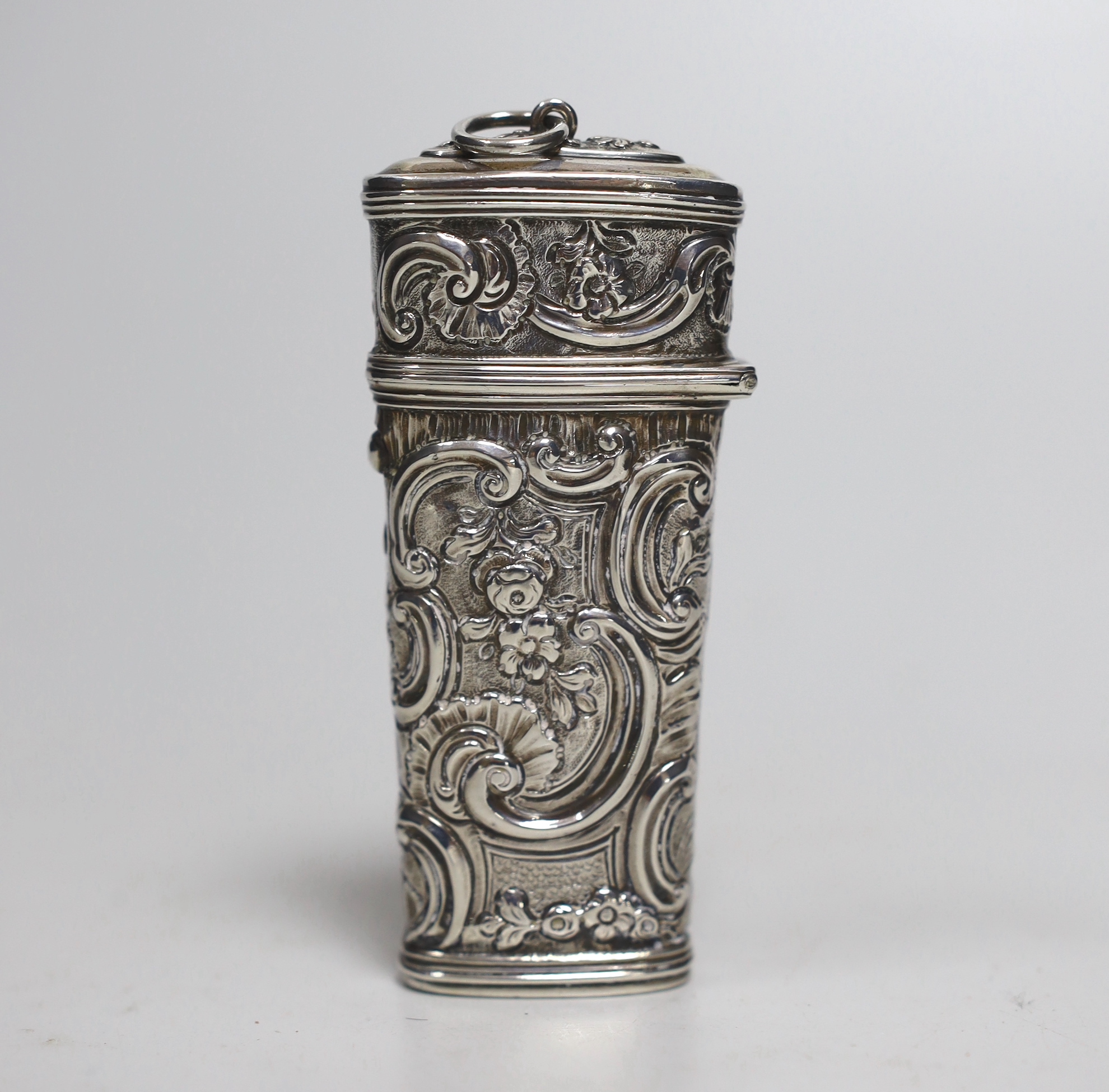 A 19th century continental embossed white metal etui, (lacking almost all implements), 88mm.